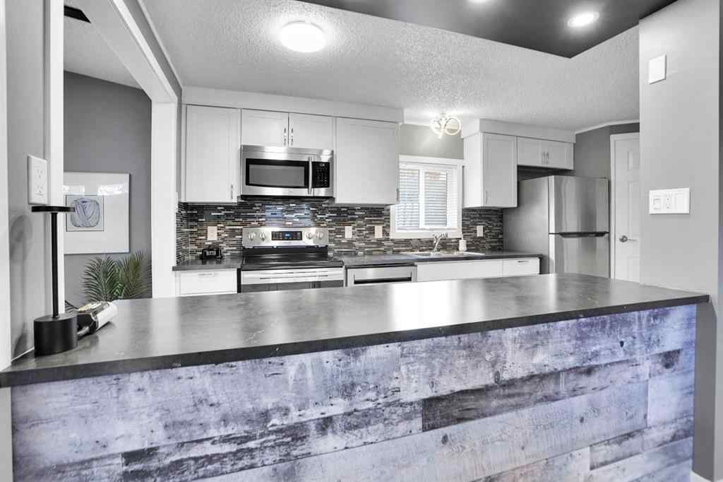 MLS&reg; # A2271534 - Unit #208 3223 83 Street NW in Greenwood/Greenbriar Calgary, Mobile Open Houses