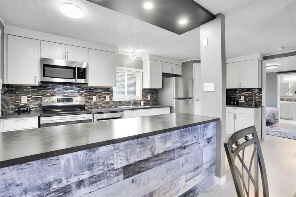 MLS&reg; # A2271534 - Unit #208 3223 83 Street NW in Greenwood/Greenbriar Calgary, Mobile Open Houses