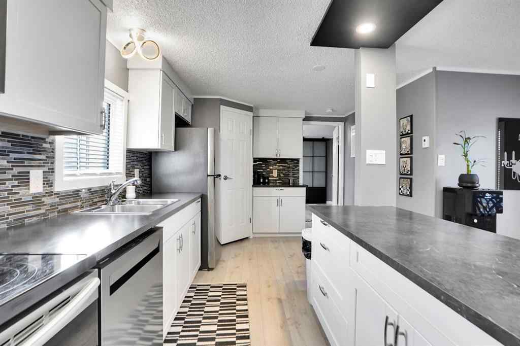 MLS&reg; # A2271534 - Unit #208 3223 83 Street NW in Greenwood/Greenbriar Calgary, Mobile Open Houses