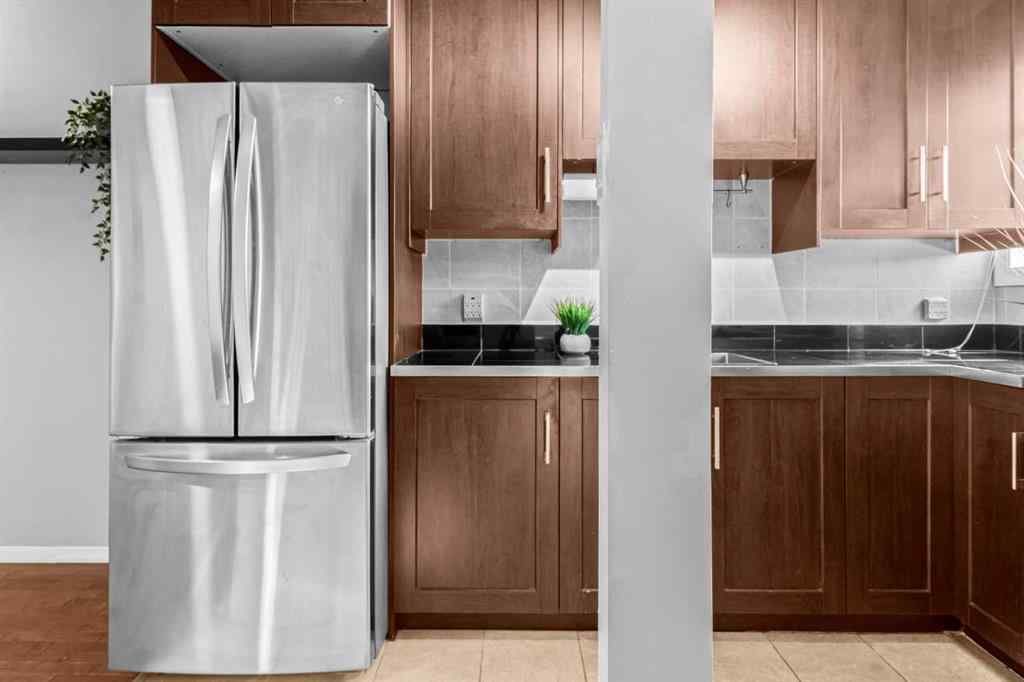 MLS&reg; # A2271562 - Unit #8 3726 Centre Street NE in Highland Park Calgary, Residential Open Houses