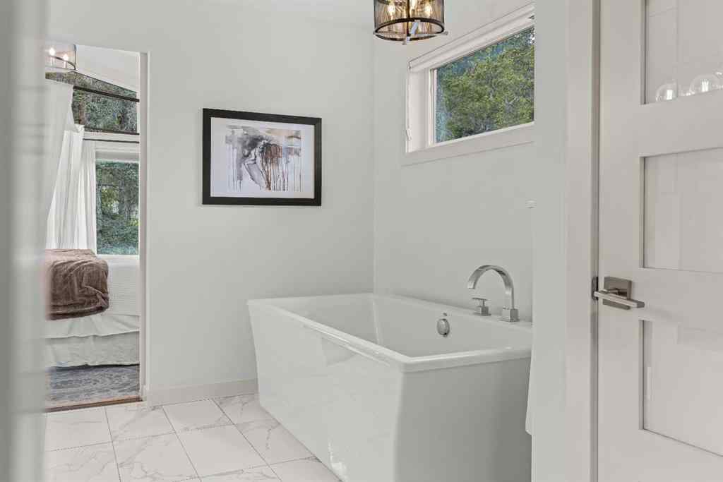 MLS&reg; # A2271598 - 445 Stewart Creek Close  in Three Sisters Canmore, Residential Open Houses