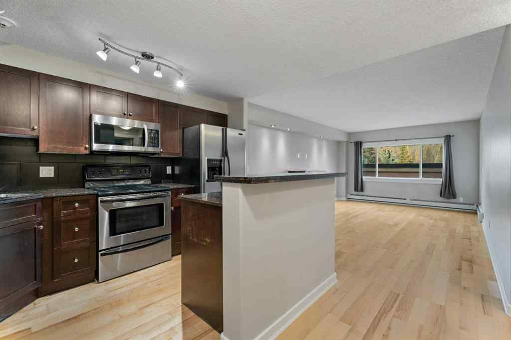 MLS&reg; # A2271617 - Unit #404 728 3 Avenue NW in Sunnyside Calgary, Residential Open Houses
