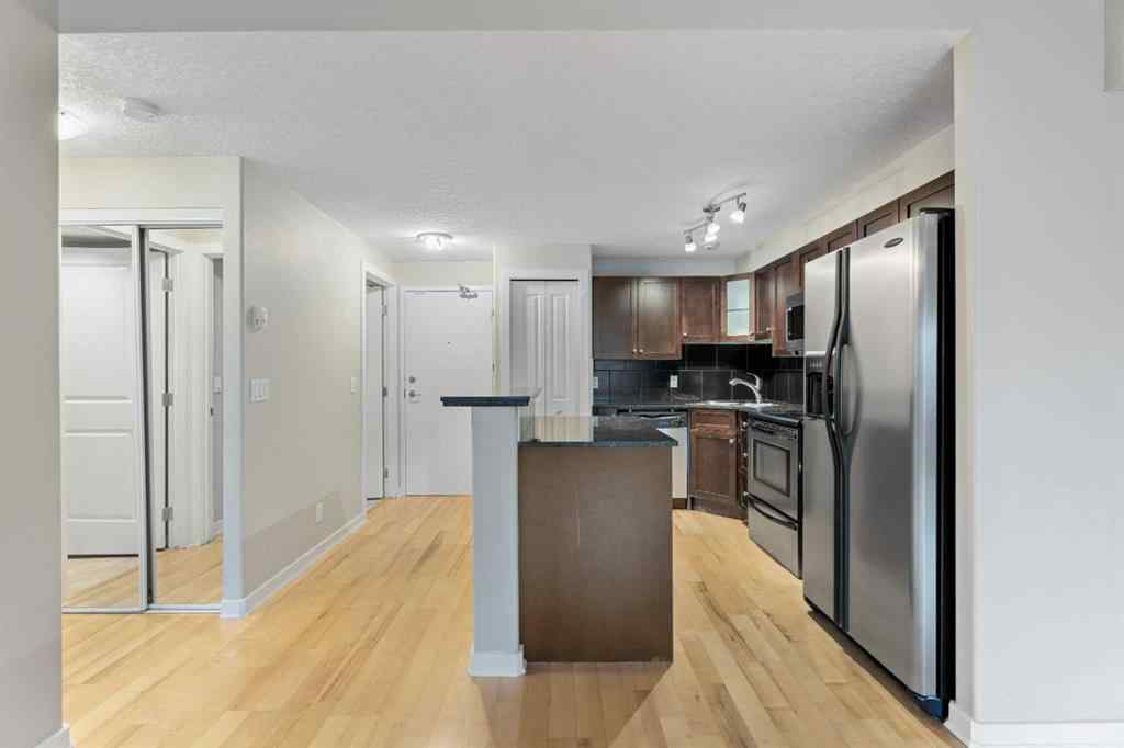 MLS&reg; # A2271617 - Unit #404 728 3 Avenue NW in Sunnyside Calgary, Residential Open Houses