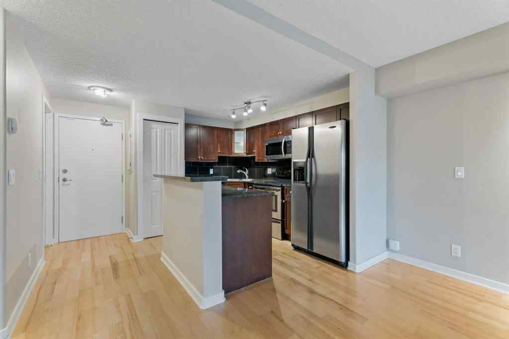 MLS&reg; # A2271617 - Unit #404 728 3 Avenue NW in Sunnyside Calgary, Residential Open Houses