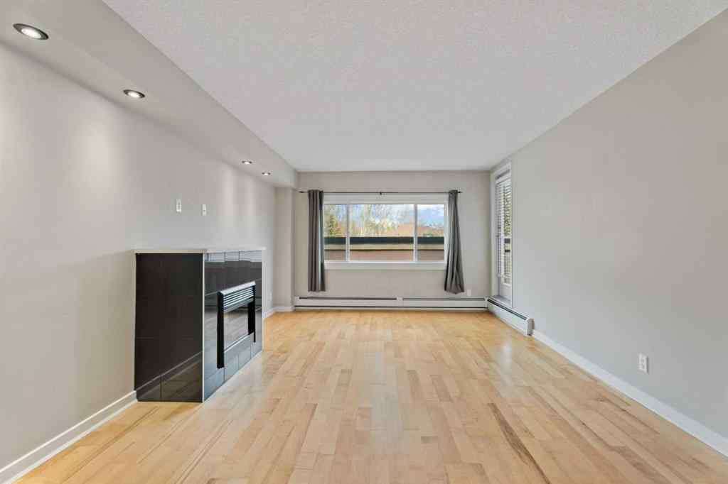 MLS&reg; # A2271617 - Unit #404 728 3 Avenue NW in Sunnyside Calgary, Residential Open Houses
