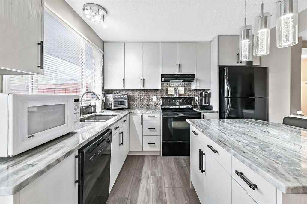 MLS&reg; # A2271630 - 307 Elgin Place SE in McKenzie Towne Calgary, Residential Open Houses