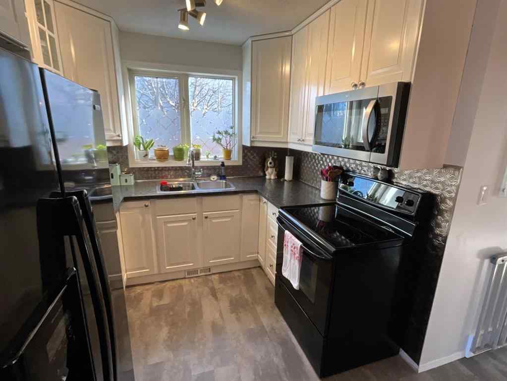 MLS&reg; # A2271648 - 34 Roland Street  in Rosedale Estates Red Deer, Residential Open Houses