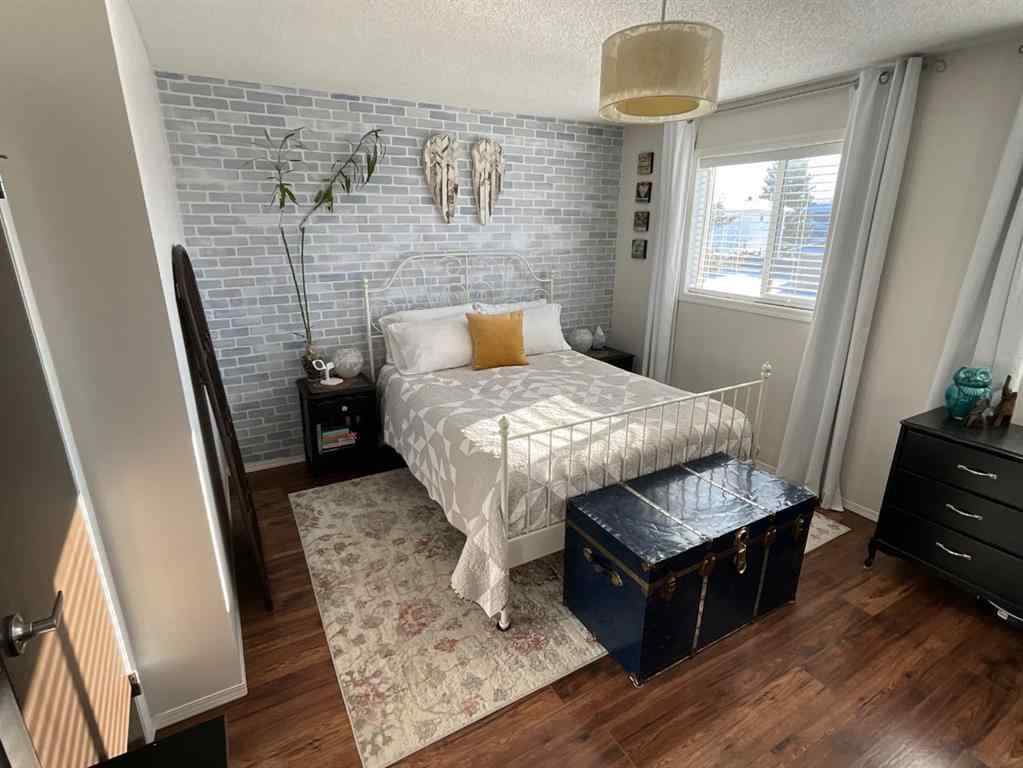 MLS&reg; # A2271648 - 34 Roland Street  in Rosedale Estates Red Deer, Residential Open Houses