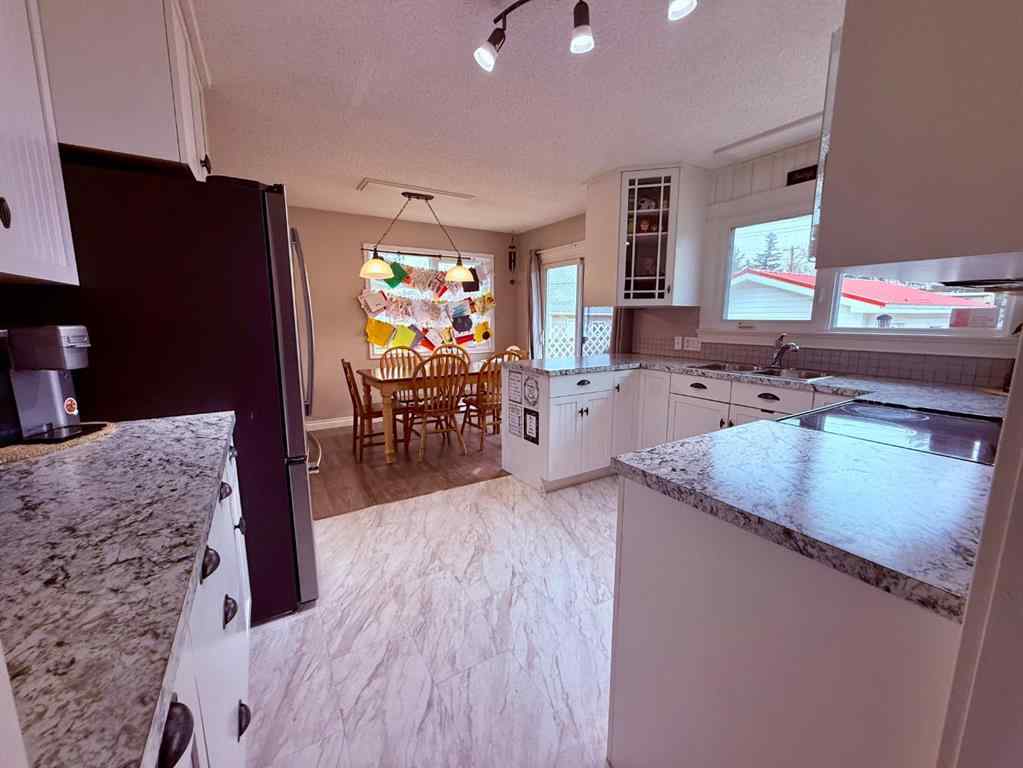 MLS&reg; # A2271656 - 614 5 Avenue W in Hanna Hanna, Residential Open Houses