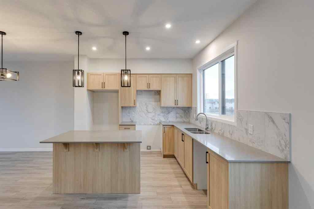 MLS&reg; # A2271669 - Unit #101 81 Midtown Boulevard SW in Midtown Airdrie, Residential Open Houses