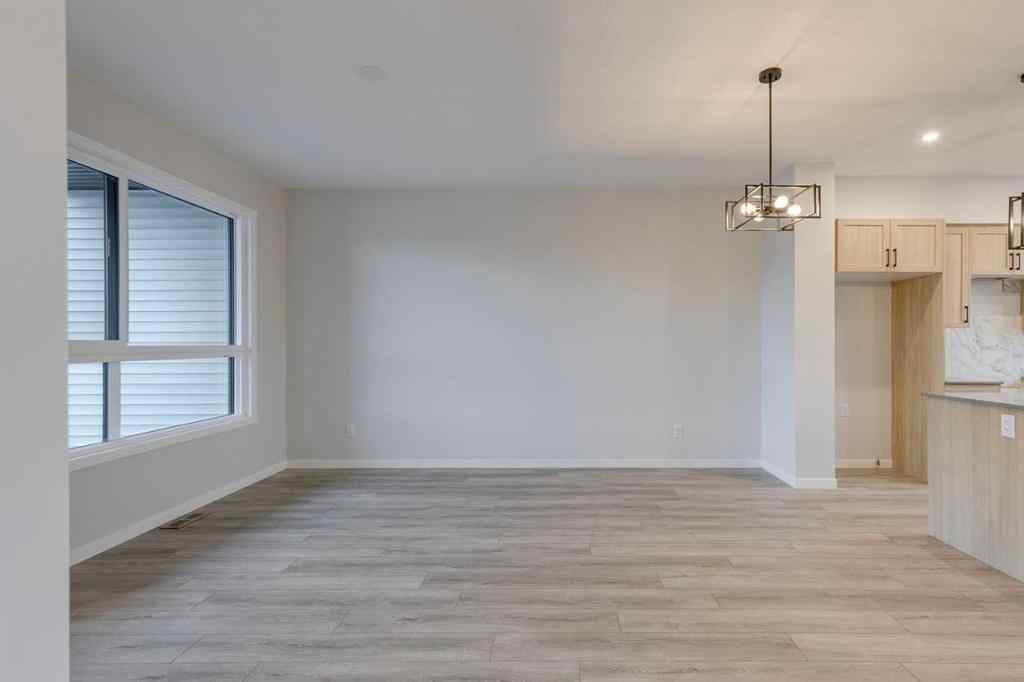 MLS&reg; # A2271669 - Unit #101 81 Midtown Boulevard SW in Midtown Airdrie, Residential Open Houses