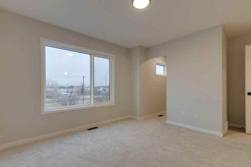 MLS&reg; # A2271669 - Unit #101 81 Midtown Boulevard SW in Midtown Airdrie, Residential Open Houses