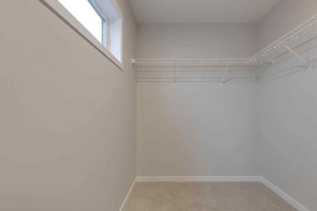 MLS&reg; # A2271669 - Unit #101 81 Midtown Boulevard SW in Midtown Airdrie, Residential Open Houses