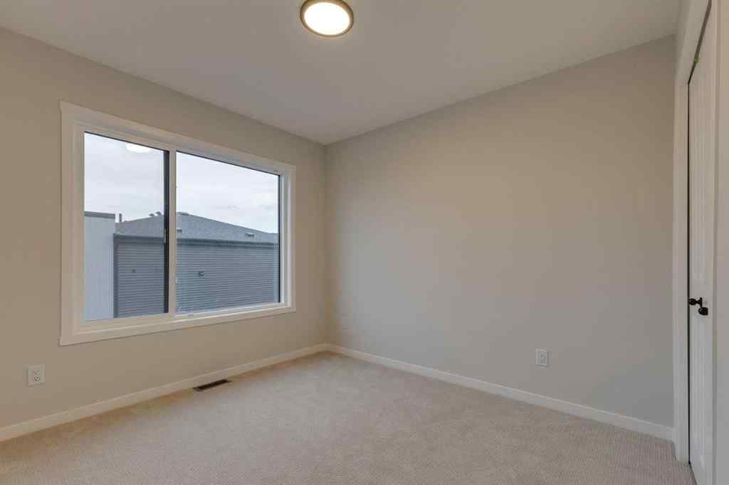 MLS&reg; # A2271669 - Unit #101 81 Midtown Boulevard SW in Midtown Airdrie, Residential Open Houses