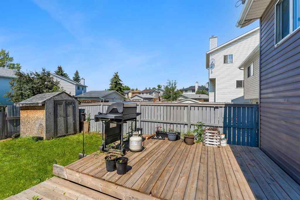 MLS&reg; # A2271699 - 63 Erin Green Way SE in Erin Woods Calgary, Residential Open Houses