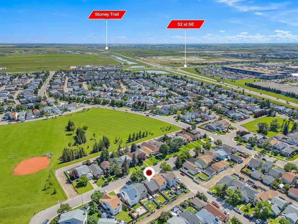 MLS&reg; # A2271699 - 63 Erin Green Way SE in Erin Woods Calgary, Residential Open Houses