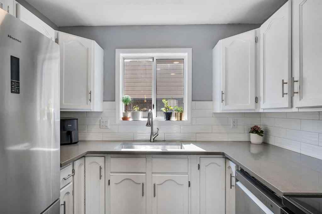 MLS&reg; # A2271699 - 63 Erin Green Way SE in Erin Woods Calgary, Residential Open Houses