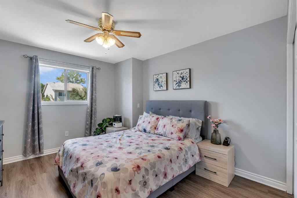 MLS&reg; # A2271699 - 63 Erin Green Way SE in Erin Woods Calgary, Residential Open Houses