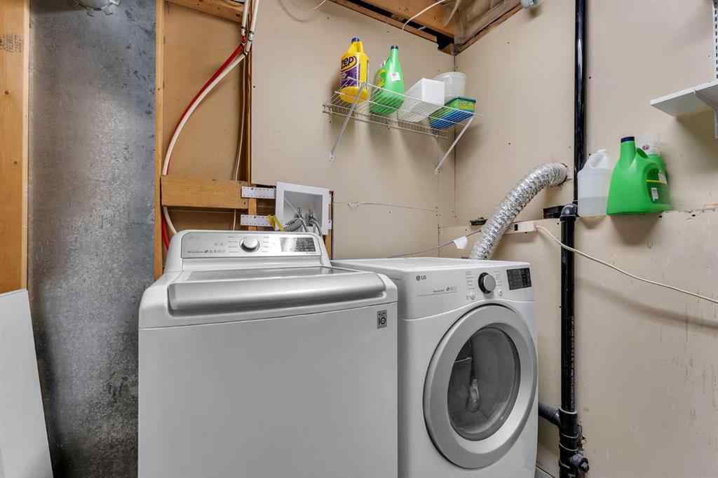 MLS&reg; # A2271699 - 63 Erin Green Way SE in Erin Woods Calgary, Residential Open Houses