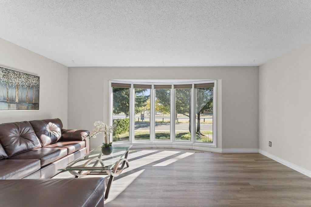 MLS&reg; # A2271714 - 47 Woodmont Way SW in Woodbine Calgary, Residential Open Houses