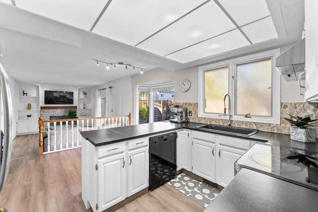 MLS&reg; # A2271714 - 47 Woodmont Way SW in Woodbine Calgary, Residential Open Houses