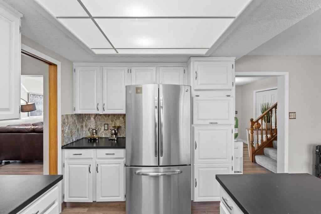 MLS&reg; # A2271714 - 47 Woodmont Way SW in Woodbine Calgary, Residential Open Houses