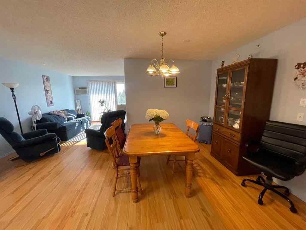 MLS&reg; # A2271728 - Unit #405 1881 17 Street  in NONE Didsbury, Residential Open Houses