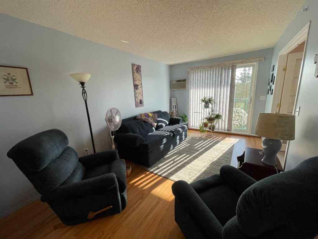 MLS&reg; # A2271728 - Unit #405 1881 17 Street  in NONE Didsbury, Residential Open Houses