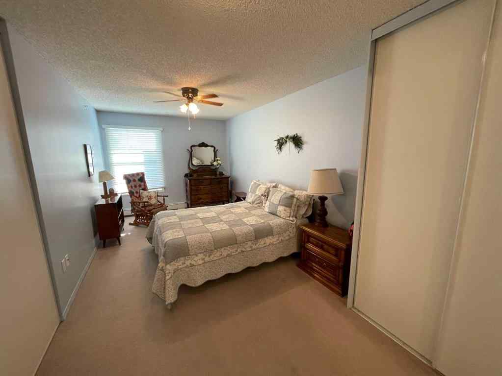 MLS&reg; # A2271728 - Unit #405 1881 17 Street  in NONE Didsbury, Residential Open Houses