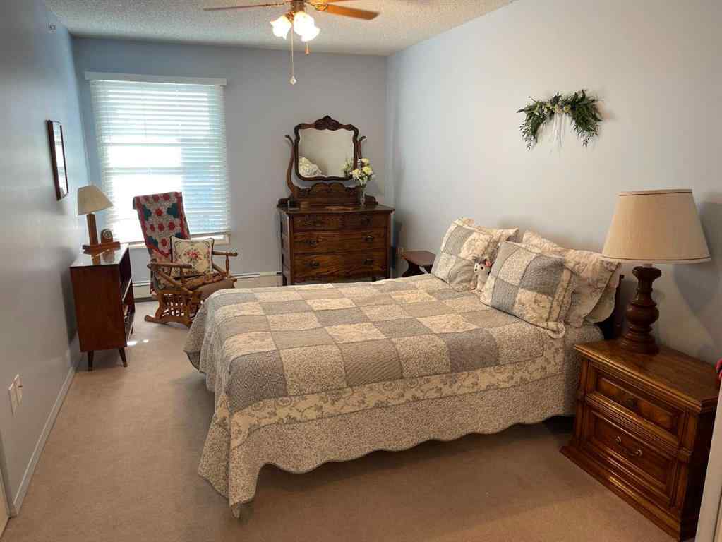 MLS&reg; # A2271728 - Unit #405 1881 17 Street  in NONE Didsbury, Residential Open Houses