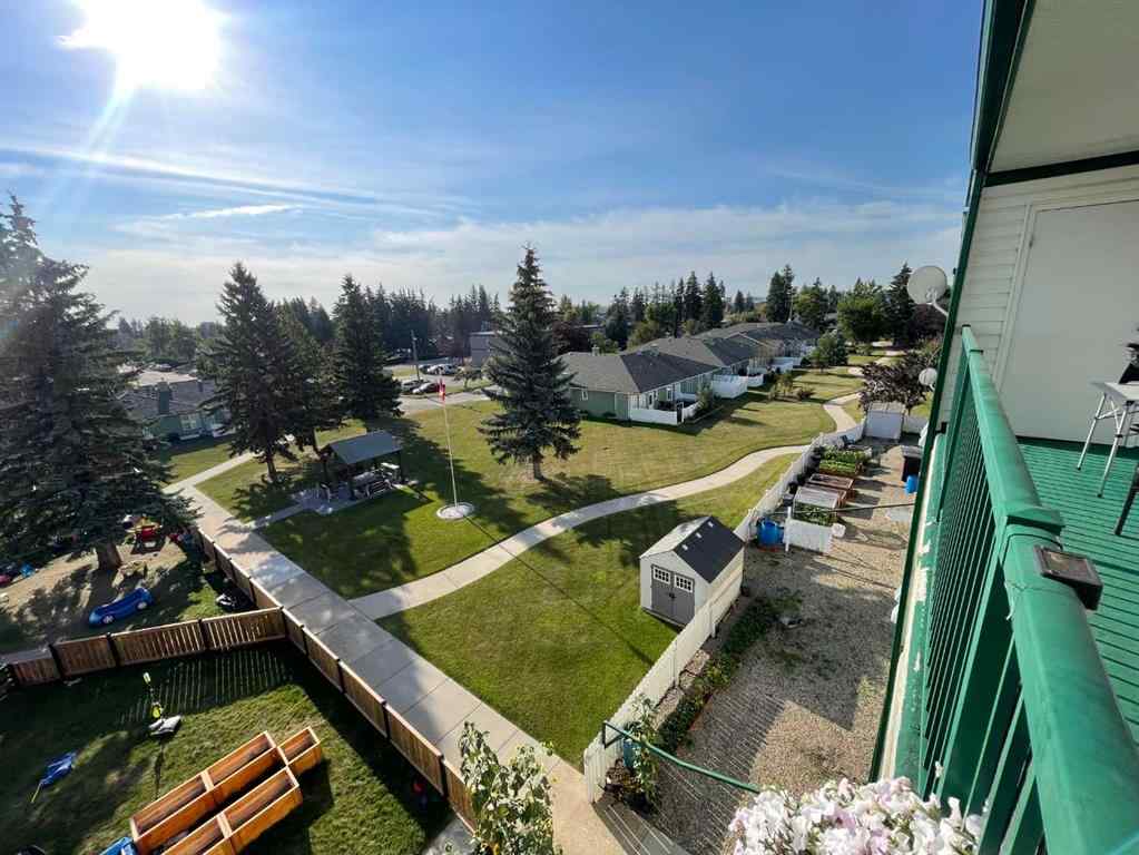 MLS&reg; # A2271728 - Unit #405 1881 17 Street  in NONE Didsbury, Residential Open Houses