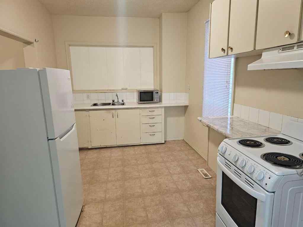 MLS&reg; # A2271763 - 1522 11 Avenue SW in Sunalta Calgary, Residential Open Houses