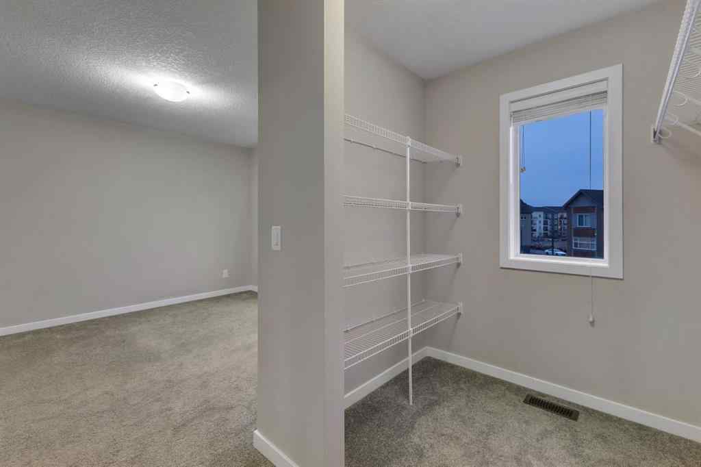 MLS® # A2271768 - 116 Copperstone Villas SE in Copperfield Calgary, Residential Open Houses