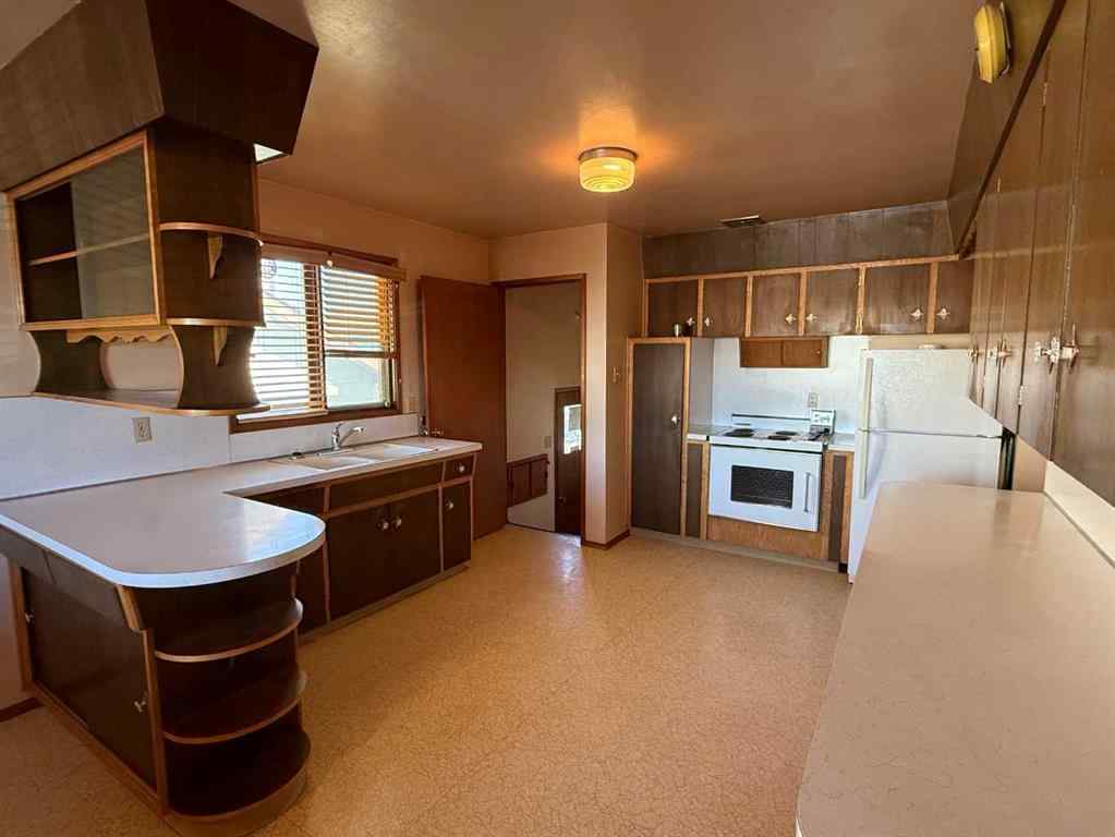 MLS&reg; # A2271771 - 111 27 Avenue NE in Tuxedo Park Calgary, Residential Open Houses