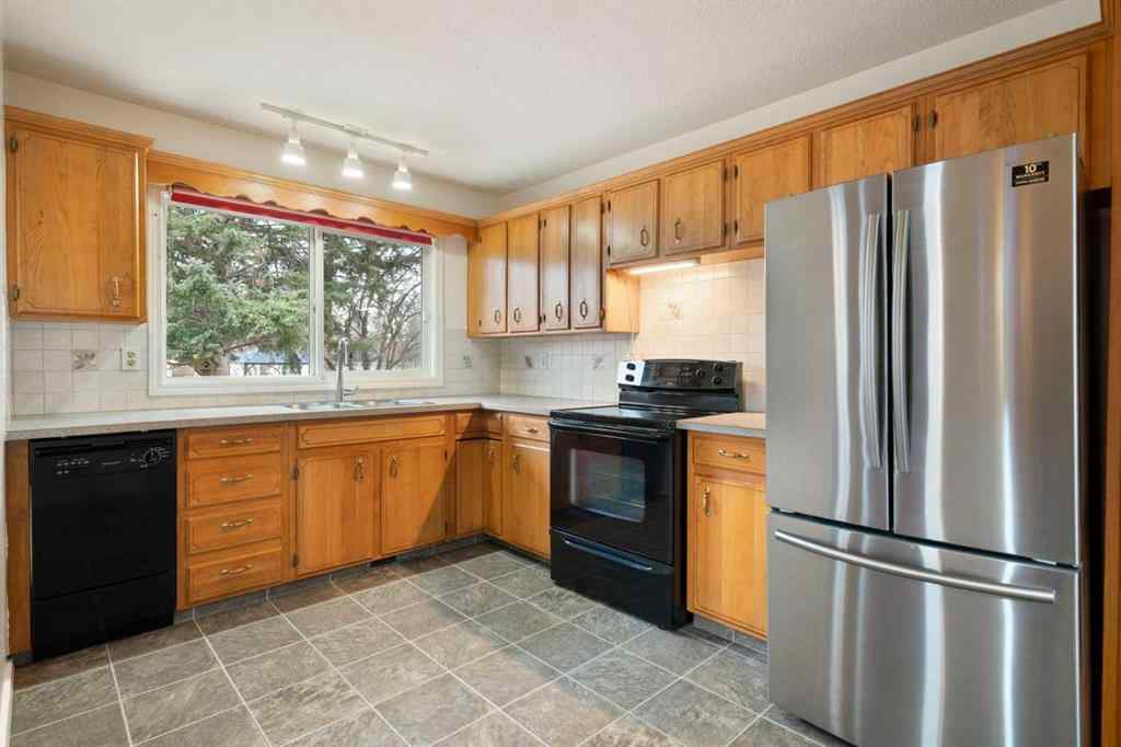 MLS&reg; # A2271776 - 123 Glacier Drive SW in Glamorgan Calgary, Residential Open Houses