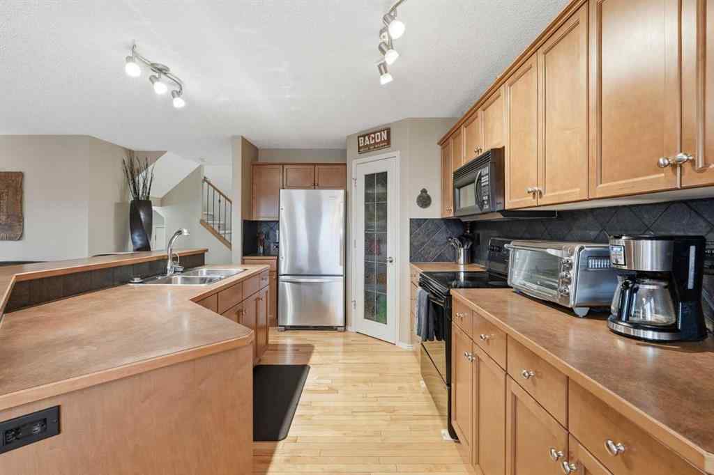 MLS&reg; # A2271780 - 149 Springborough Way SW in Springbank Hill Calgary, Residential Open Houses