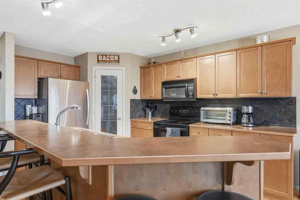 MLS&reg; # A2271780 - 149 Springborough Way SW in Springbank Hill Calgary, Residential Open Houses