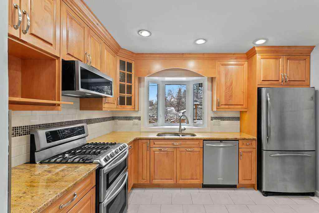 MLS® # A2271801 - 6407 Lombardy Crescent SW in North Glenmore Park Calgary, Residential Open Houses