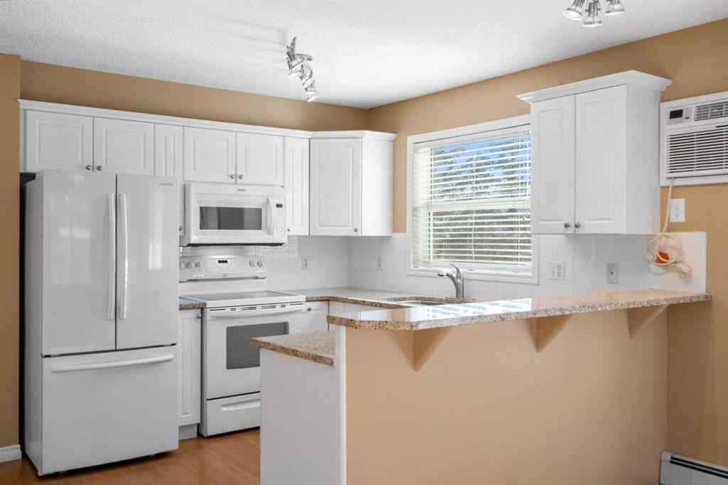 MLS&reg; # A2271987 - Unit #205 6800 Hunterview Drive NW in Huntington Hills Calgary, Residential Open Houses
