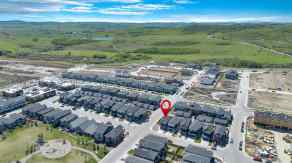 Just listed Pine Creek homes for sale new 31 Creekside Grove SW in Pine Creek Calgary