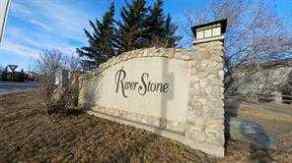 Just listed Riverstone homes for sale new 321 Rivergrove Chase W in Riverstone Lethbridge