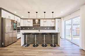 Just listed Highwood homes for sale new 77 Hartford Road NW in Highwood Calgary