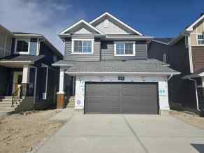 Just listed Bayside homes for sale new 512 Baywater Manor SW in Bayside Airdrie