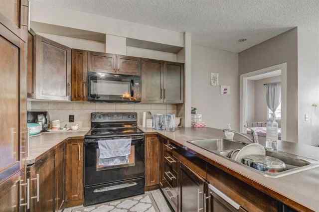 210, 48 Panatella Road NW in  Calgary MLS® #A2056702