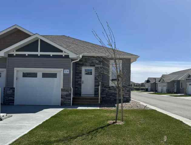 Riverstone real estate 3, 14 Riverford Close W in Riverstone Lethbridge
