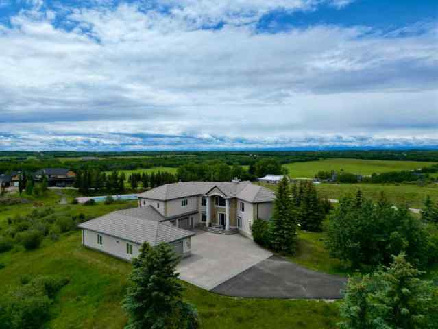 Bearspaw_Calg real estate 262060 Range Road 33   in Bearspaw_Calg Rural Rocky View County