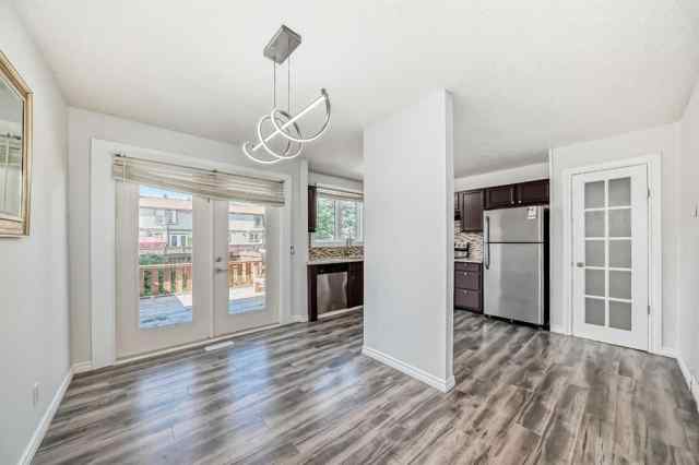 Marlborough Park real estate 100, 6103 Madigan Drive NE in Marlborough Park Calgary