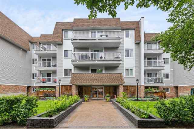 Cliff Bungalow real estate 210, 540 18 Avenue SW in Cliff Bungalow Calgary