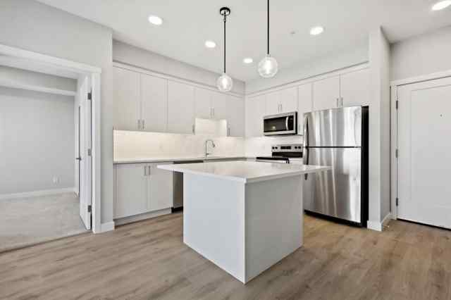 Shawnee Slopes real estate 104, 660 Shawnee Square SW in Shawnee Slopes Calgary