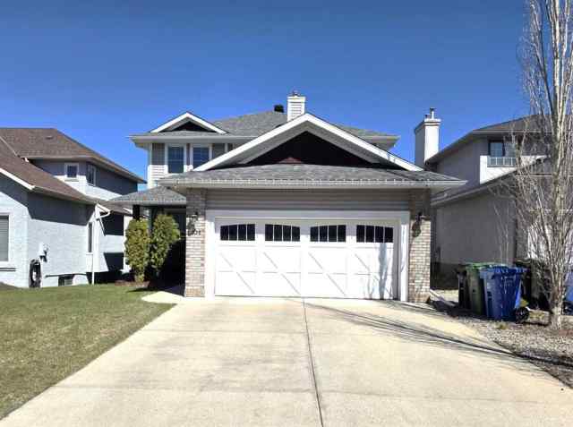 Hawkwood real estate 104 Hawktree Green NW in Hawkwood Calgary